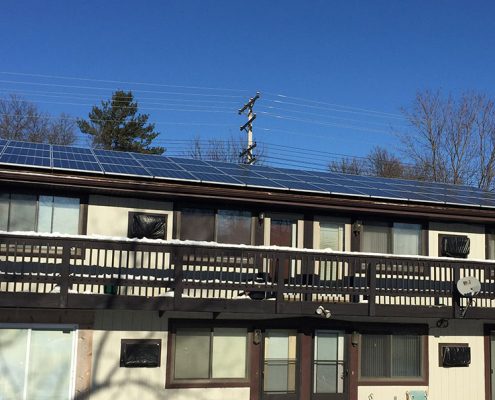 Housing initiatives building with solar panels
