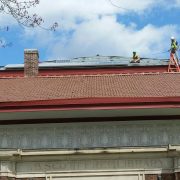 Library roof solar installation in progress
