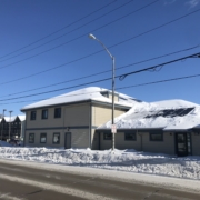 Snow-covered Literacy Network solar panels