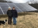 Trisha McConnell and Jim Billings in front of their solar installation